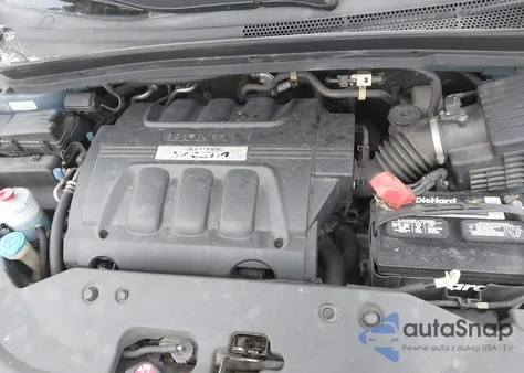 2010 Honda Odyssey Ex-L z USA, uszkodzony, nr VIN 5FNRL3H7XAB082999